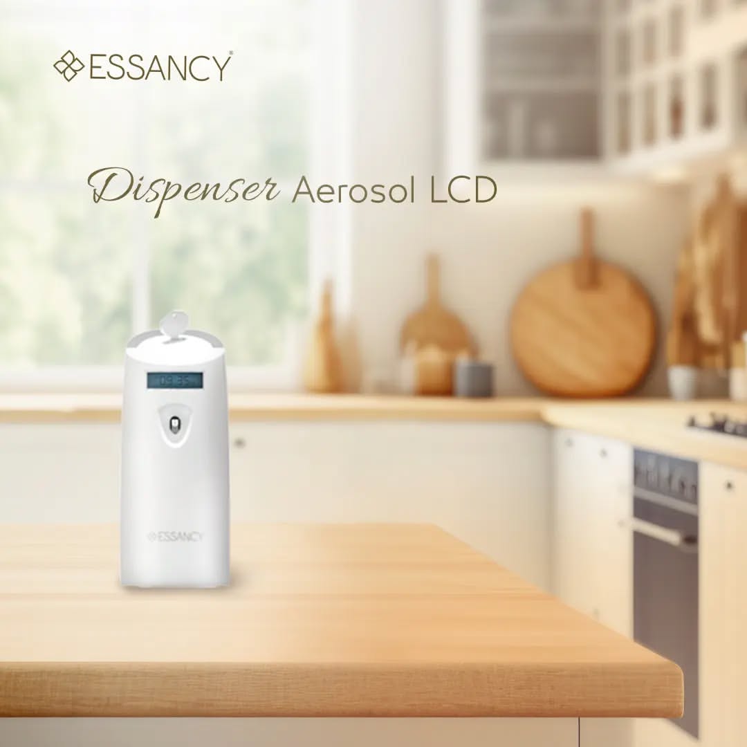 ESSANCY Aerosol LCD Dispenser on a kitchen counter with blurred background