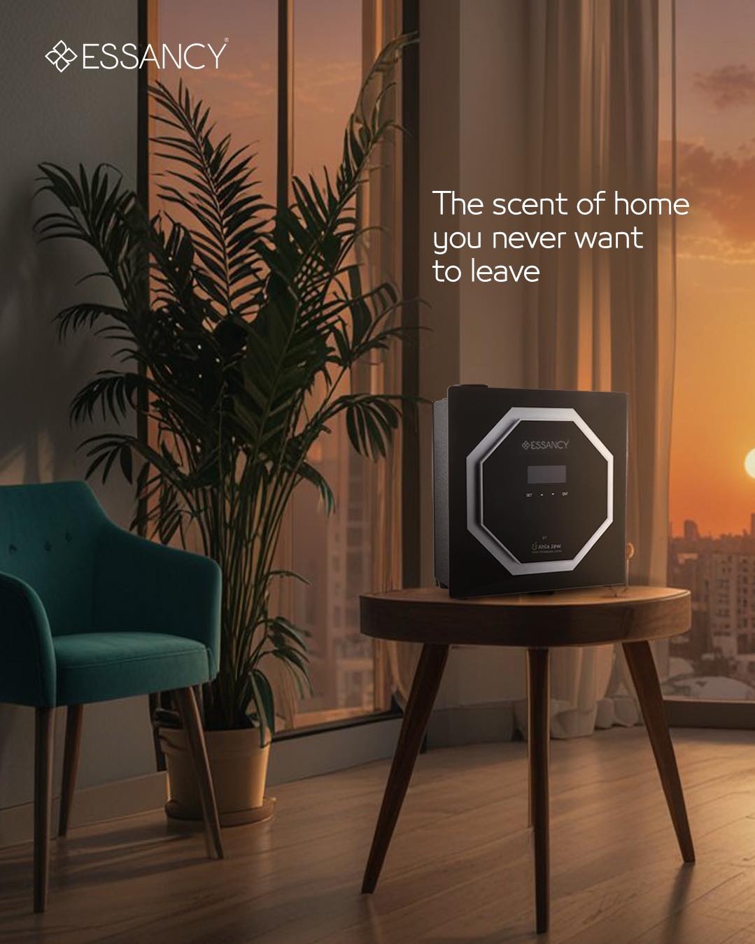 Essancy diffuser on a table with a plant and chair in a room with a sunset view.