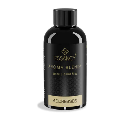 Black bottle of Essancy Aroma Blend on a white background