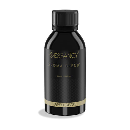 Black bottle of Essancy Sweet Grape aroma blend on a white background